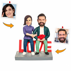 Couple Sitting on LOVE Custom Bobbleheads